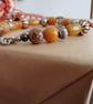 Handmade bracelet made using pre-loved beads. - Image 6