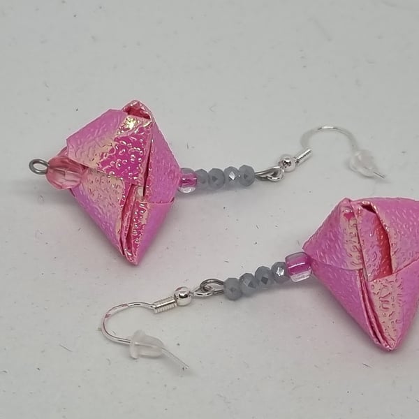 Origami earrings:  pink iridescent paper and small beads 