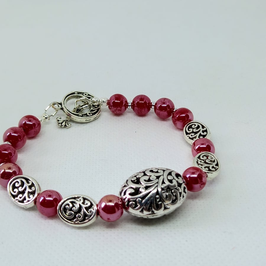 Red glass filigree bracelet 