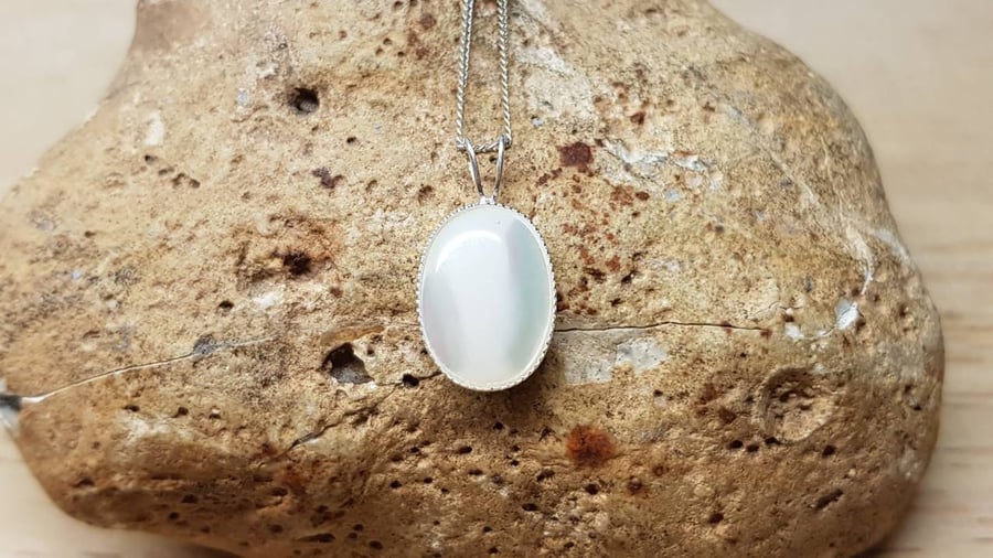 Small mother of pearl pendant. 925 sterling silver. White Reiki jewelry