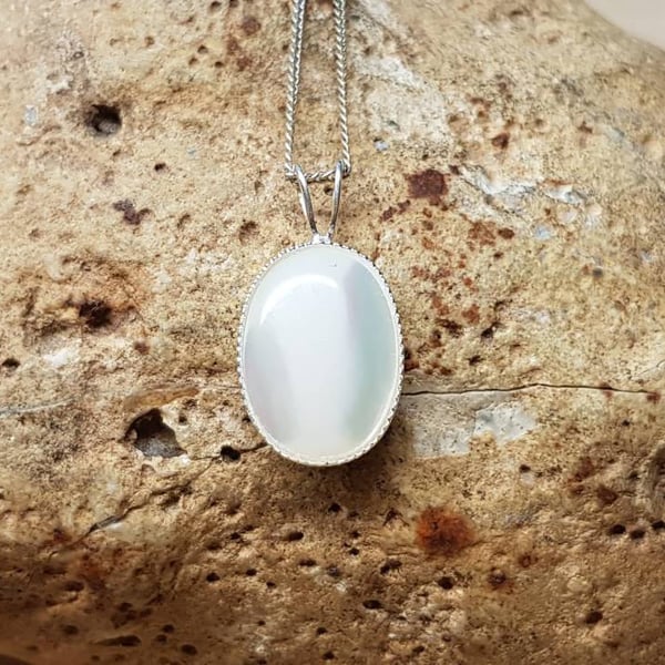 Small mother of pearl pendant. 925 sterling silver. White Reiki jewelry