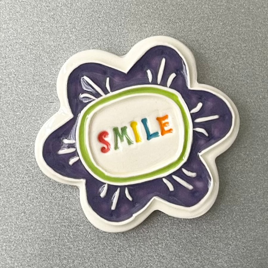Large Smile pottery magnet purple