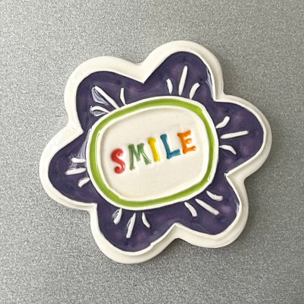 Large Smile pottery magnet purple