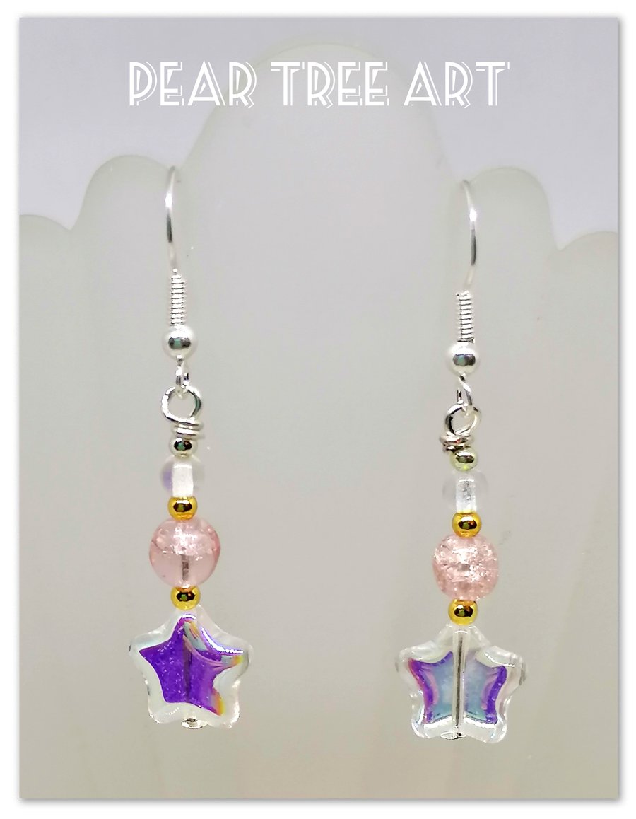 Clear glass star bead earrings with pink beads on silver plated hooks.