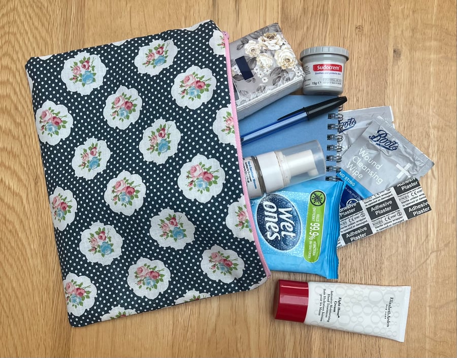 Blue spotty flower design essentials bag