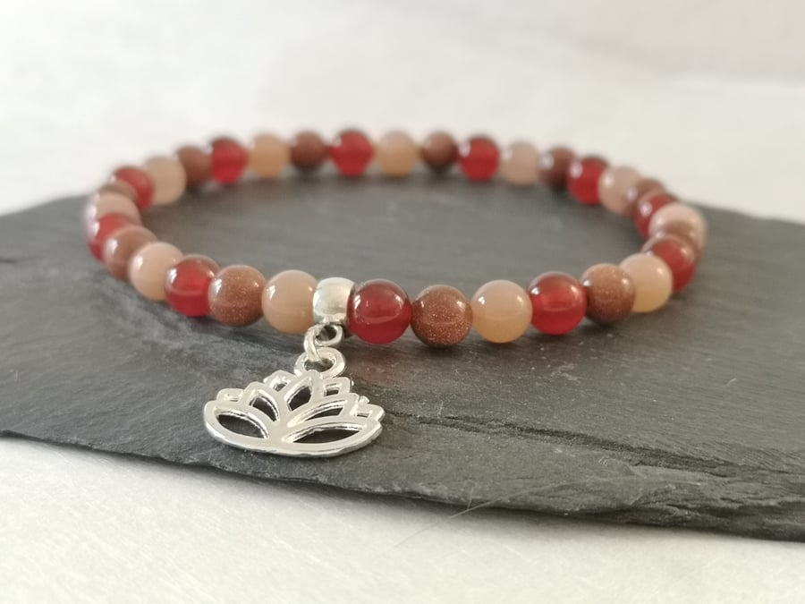 Sacral chakra carnelian, sunstone, goldstone elastic bracelet with lotus flower 