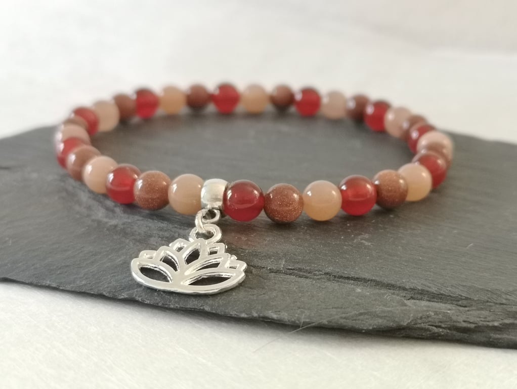 Sacral chakra carnelian, sunstone, goldstone elastic bracelet with lotus flower 