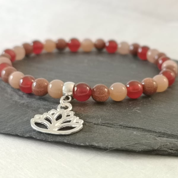 Sacral chakra carnelian, sunstone, goldstone elastic bracelet with lotus flower 