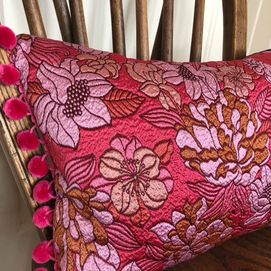 Hot pink floral and denim cushion