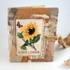 Handmade mini collage junk journal or notebook