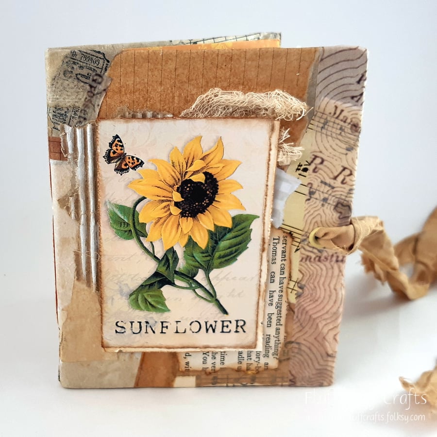 Handmade mini collage junk journal or notebook