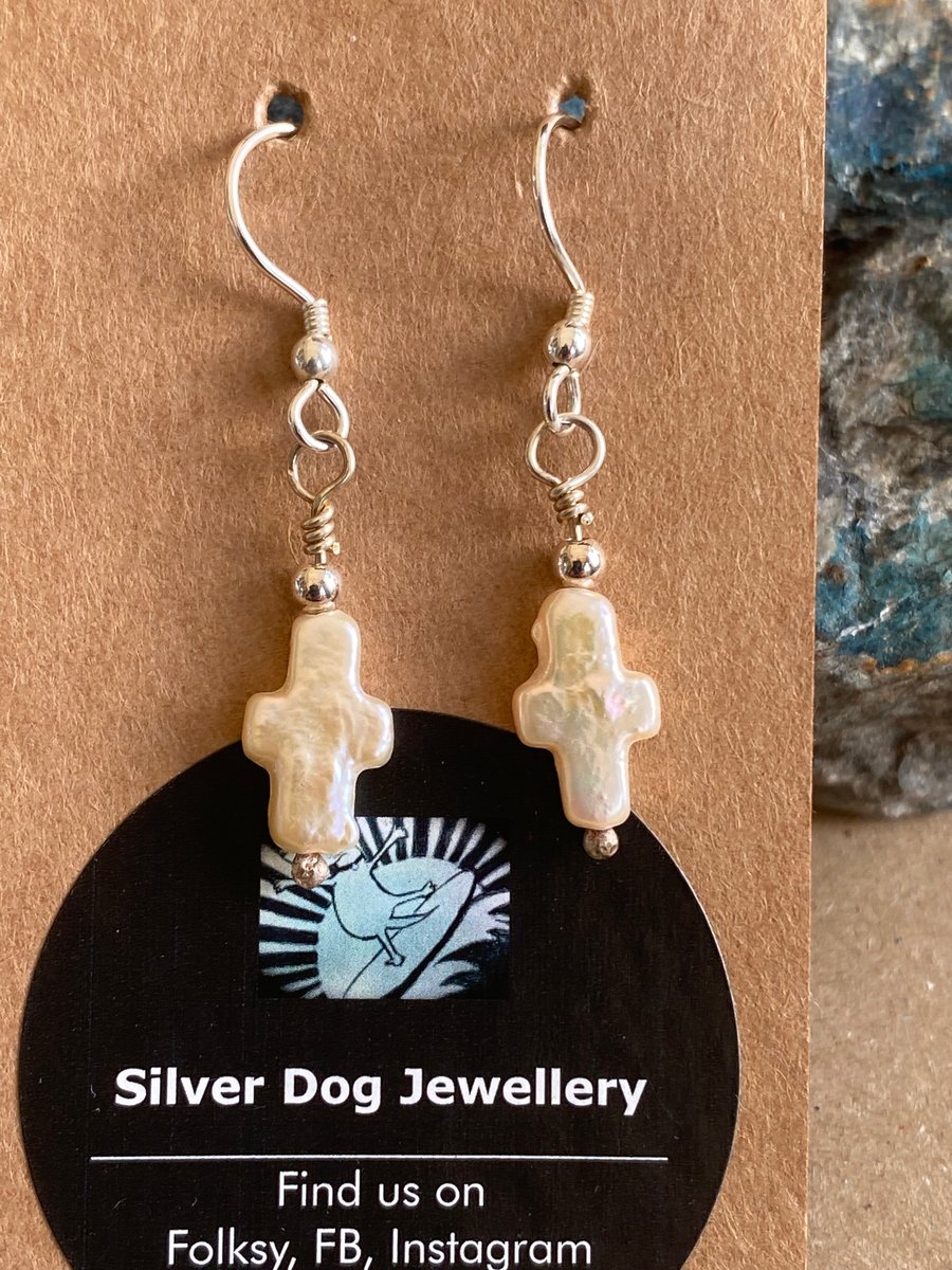 Pearl drop earrings, cross. design