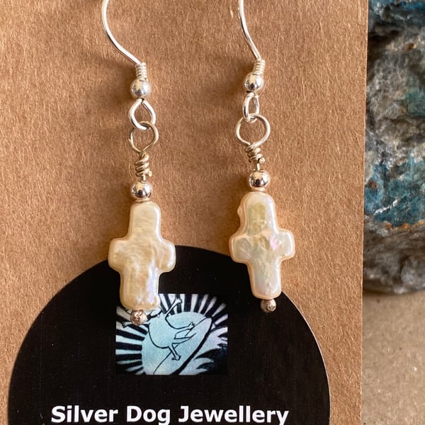Pearl drop earrings, cross. design