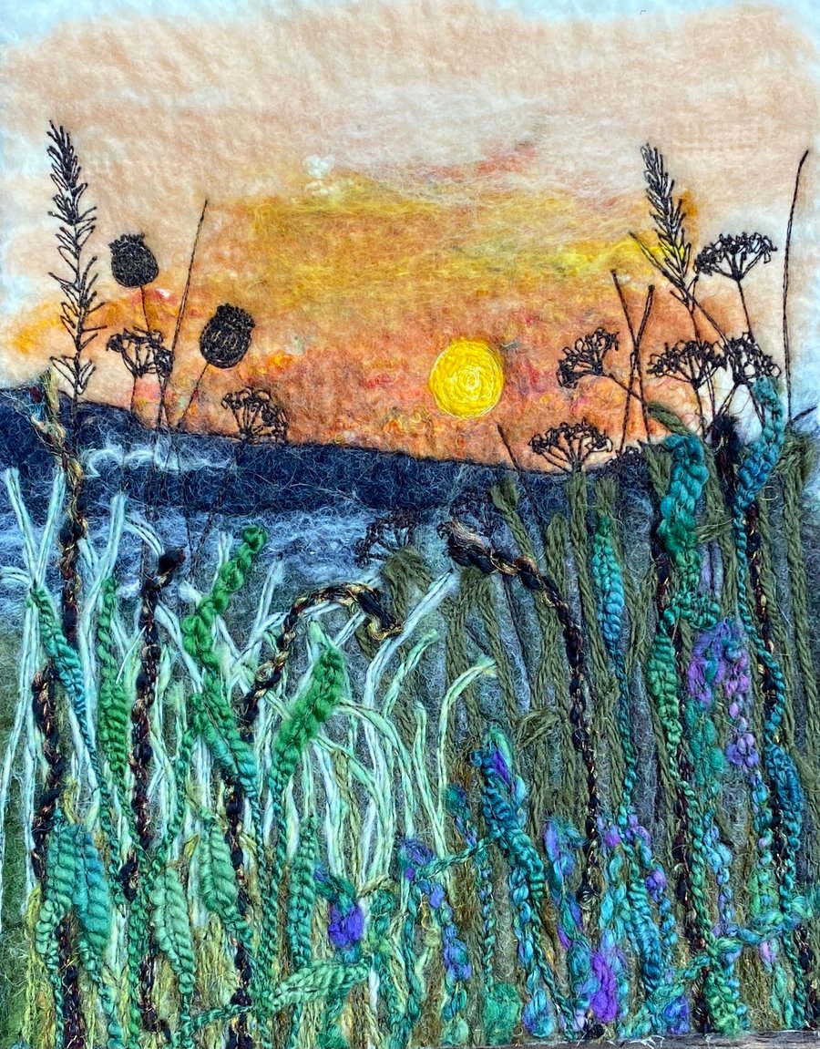 Embroidered sunset meadow hedgerow wet felting. 