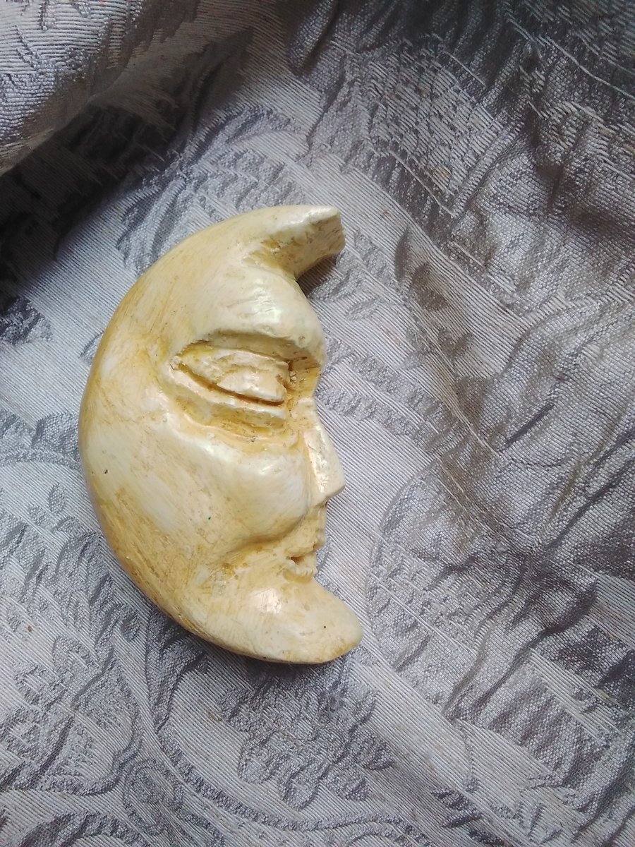 Crescent Moon Face Carving wall art