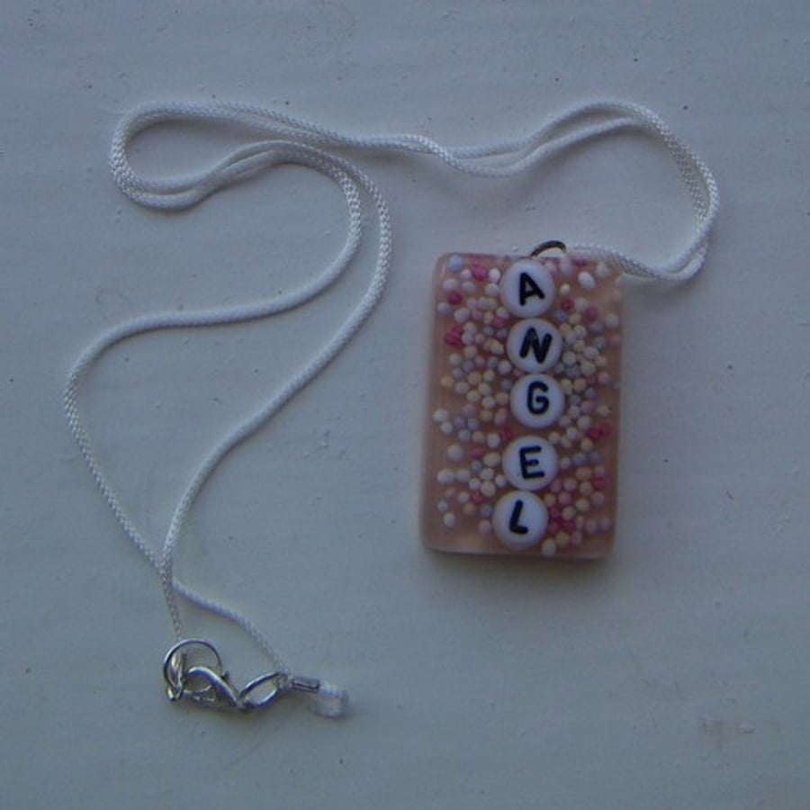 Angel resin pendant - candy filled