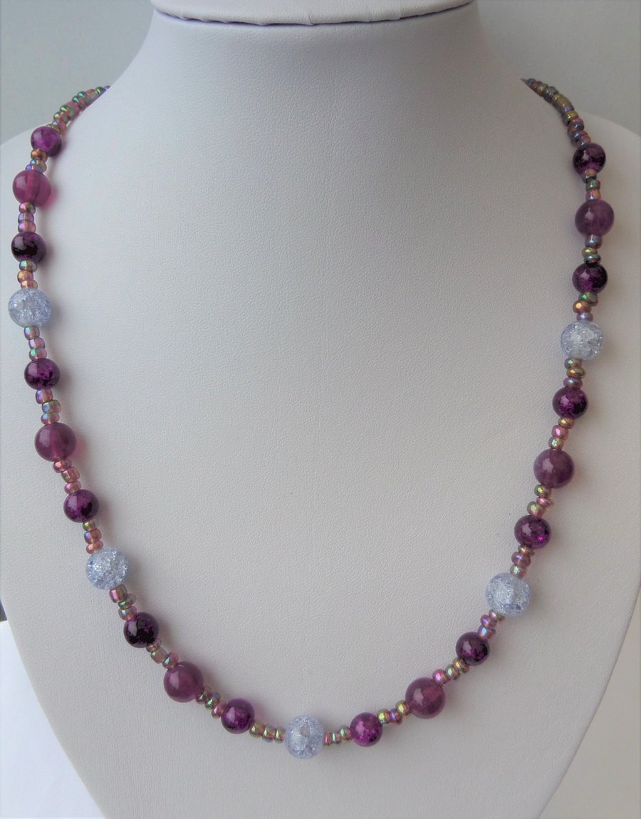 Clear and purple and rainbow metallic seed bead necklace. 