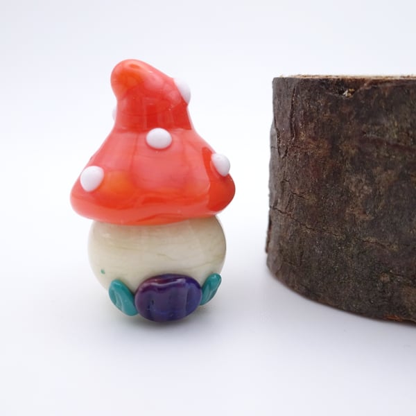 small glass toadstool house