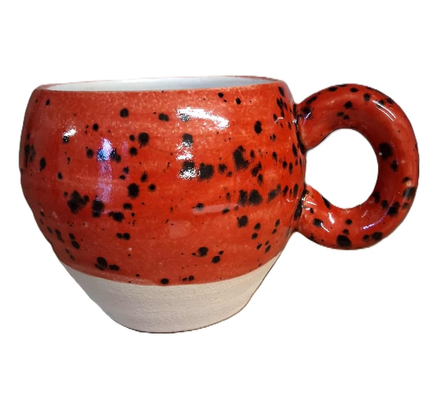 Ceramic wheel thrown Red and black Speckled Round Huggable mug .