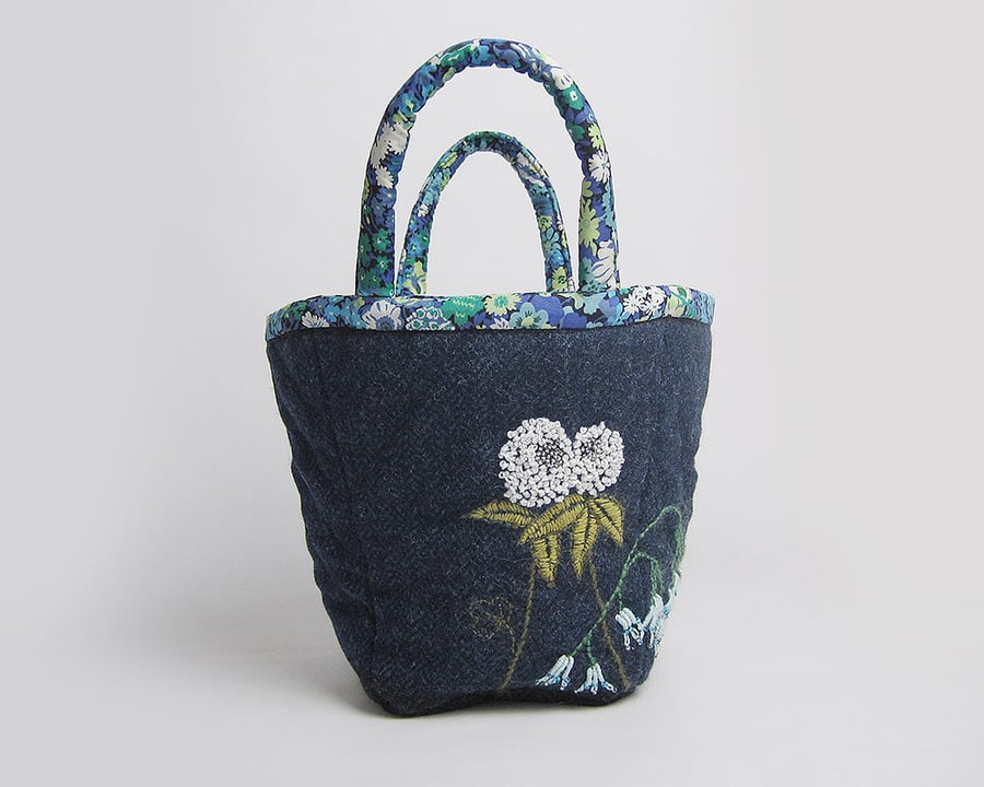 Navy wool project bag with hand embroidered flowers