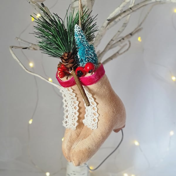 Handmade ice skates with festive tree and berries 