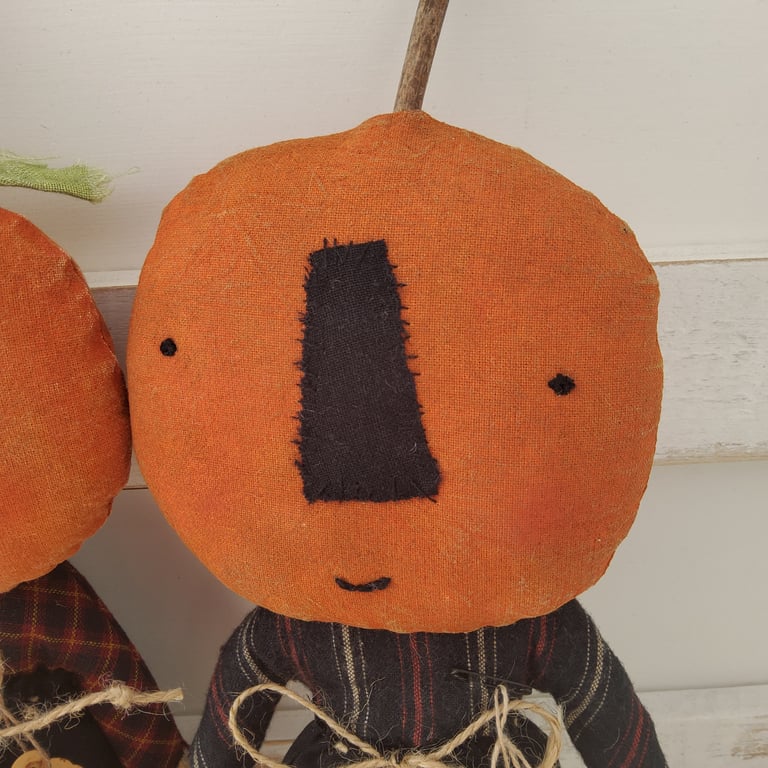 Primitive pumpkin boy doll