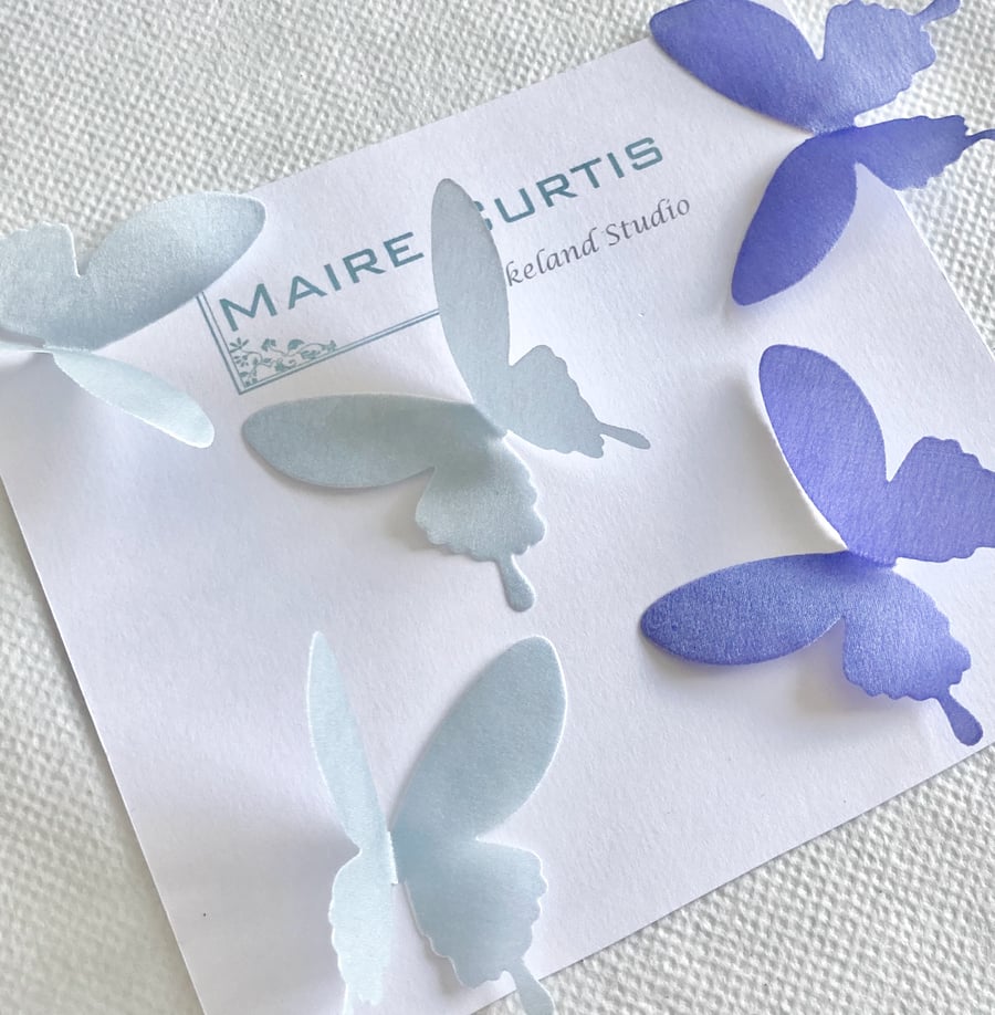 Silk satin swallowtail butterflies in shades of Blue