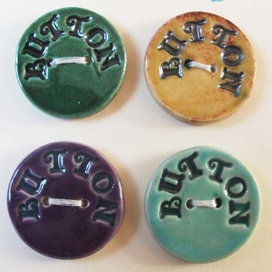 set of four large ceramic buttons
