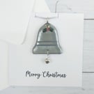 Merry Christmas Card with Festive Silver Bell Christmas Decoration