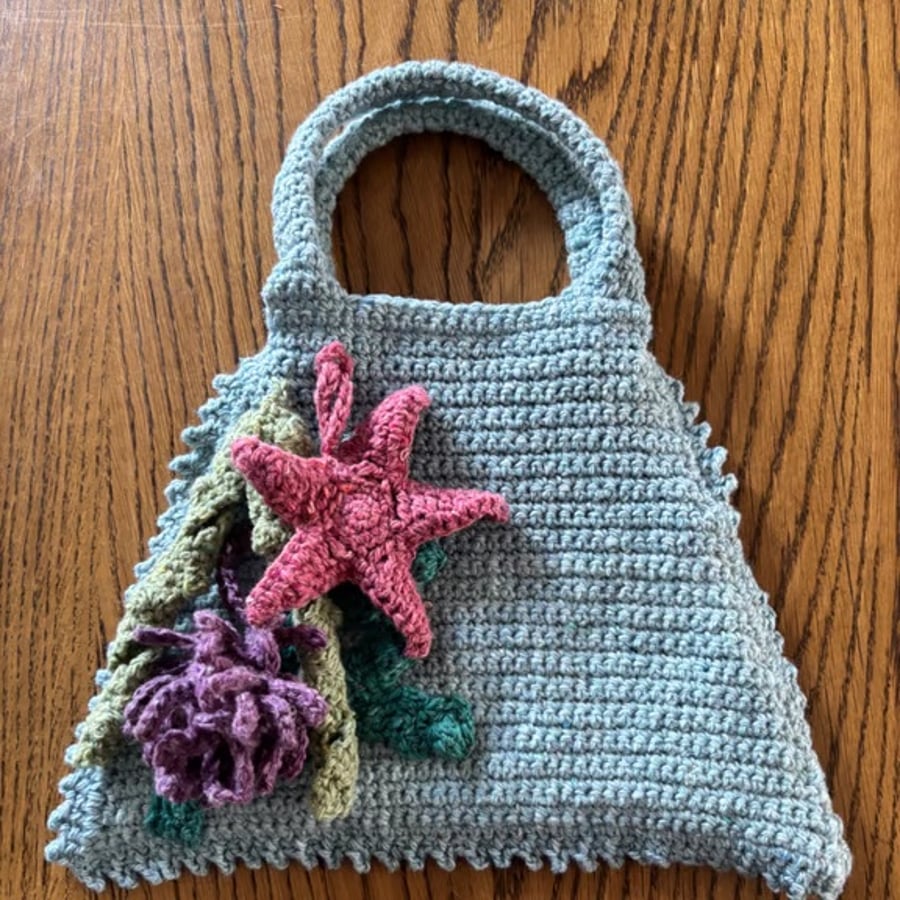 Sea-themed crochet handbag in pale blue