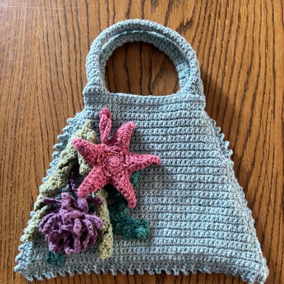 Sea-themed crochet handbag in pale blue