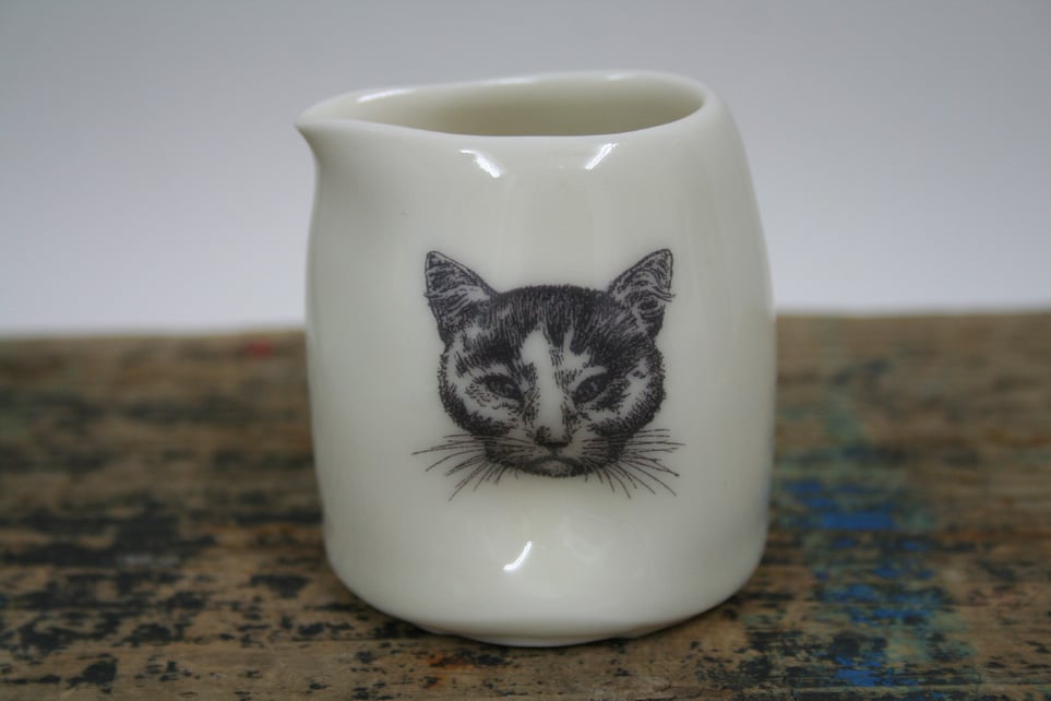 Small porcelain jug with pinched sides