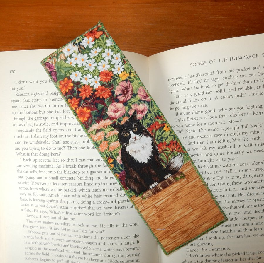 Bookmark black and white cat in the garden