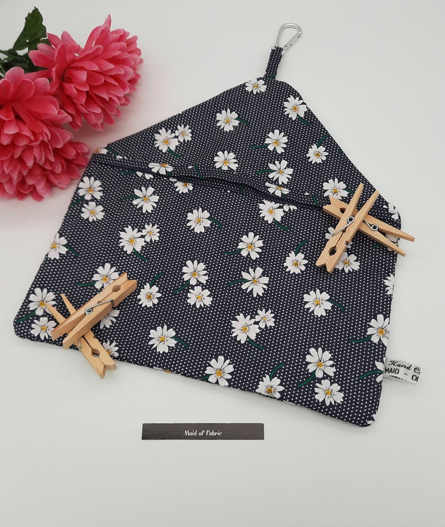 Peg bag in navy daisy cotton with carabiner clip. Free uk delivery.  