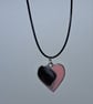 Handmade resin black and pink heart pendant on  black waxed cord