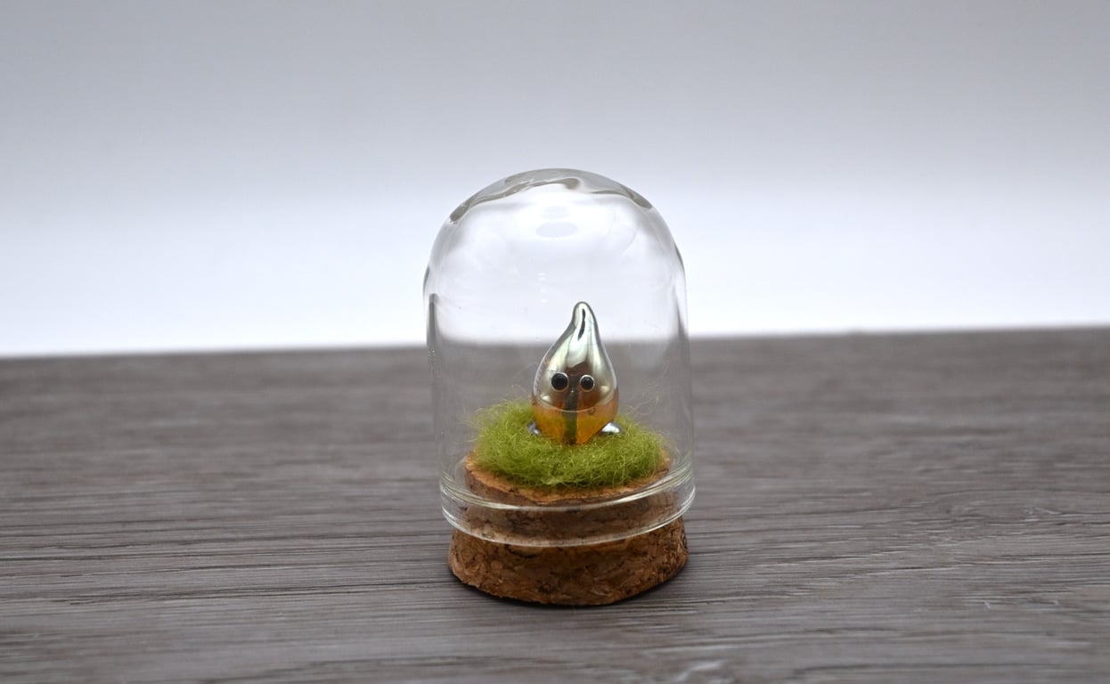 small glass wisp keepsake figure