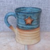 Coffee mug tea cup with a star in stoneware hand thrown pottery ceramic 