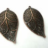 2 copper leaf pendants