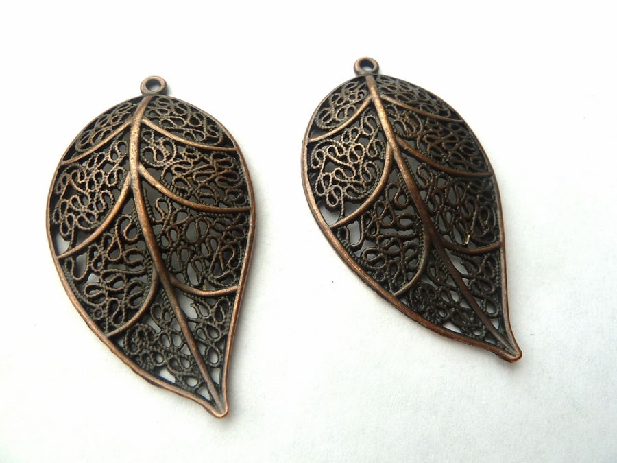 2 copper leaf pendants