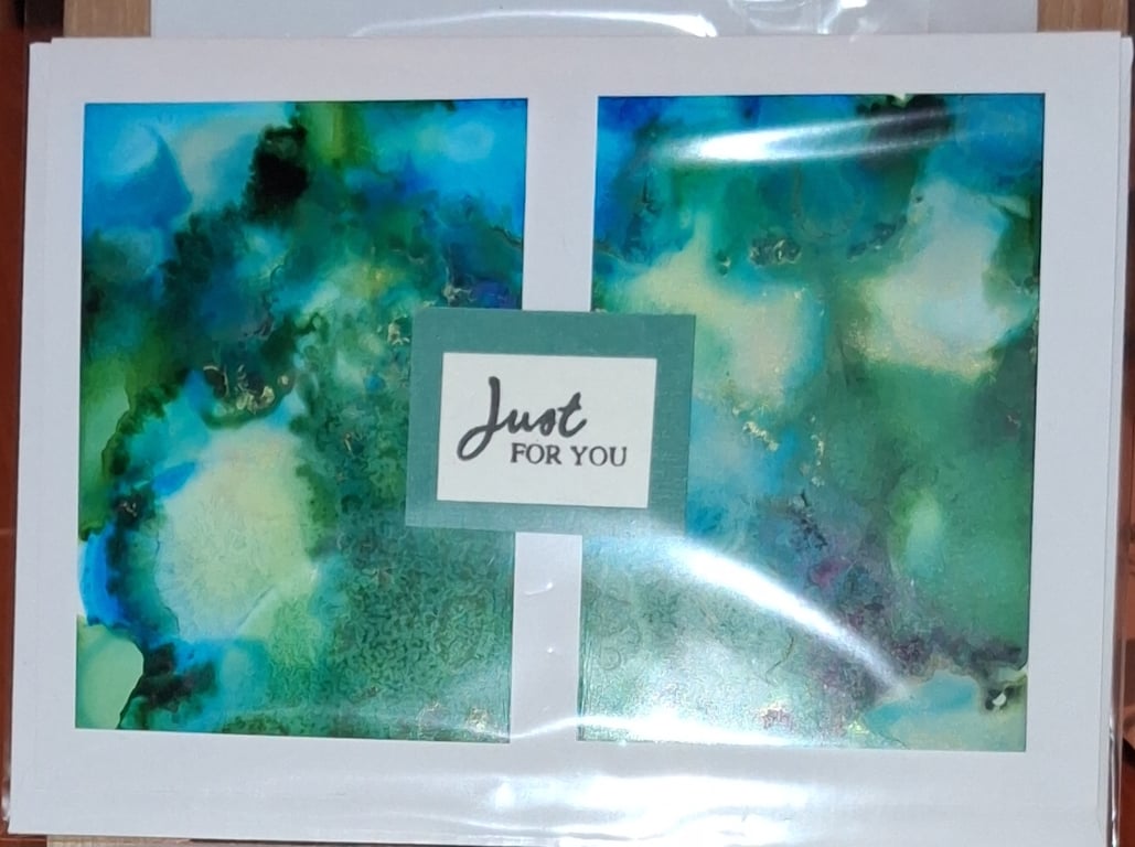 Handmade greetings card made with alcohol inks