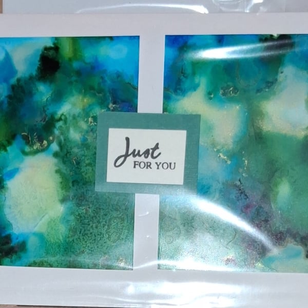 Handmade greetings card made with alcohol inks