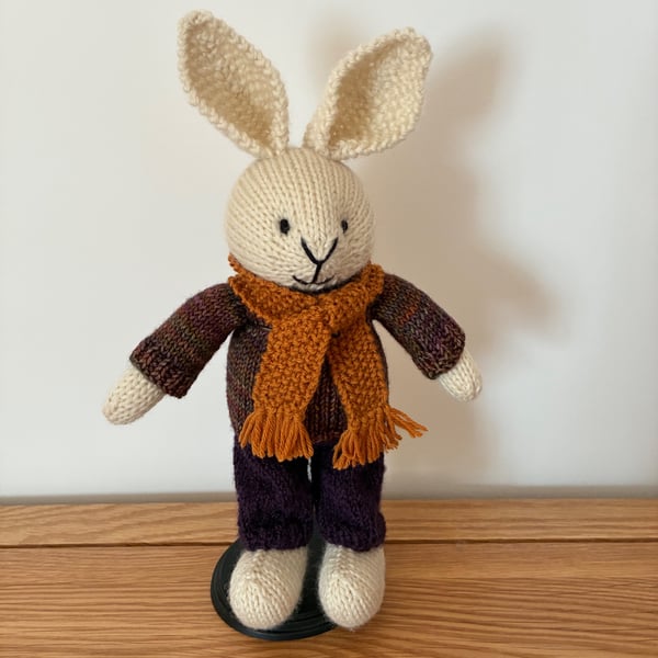 Hand Knitted Rabbit in Vargated Jumper and Purple Trousers 