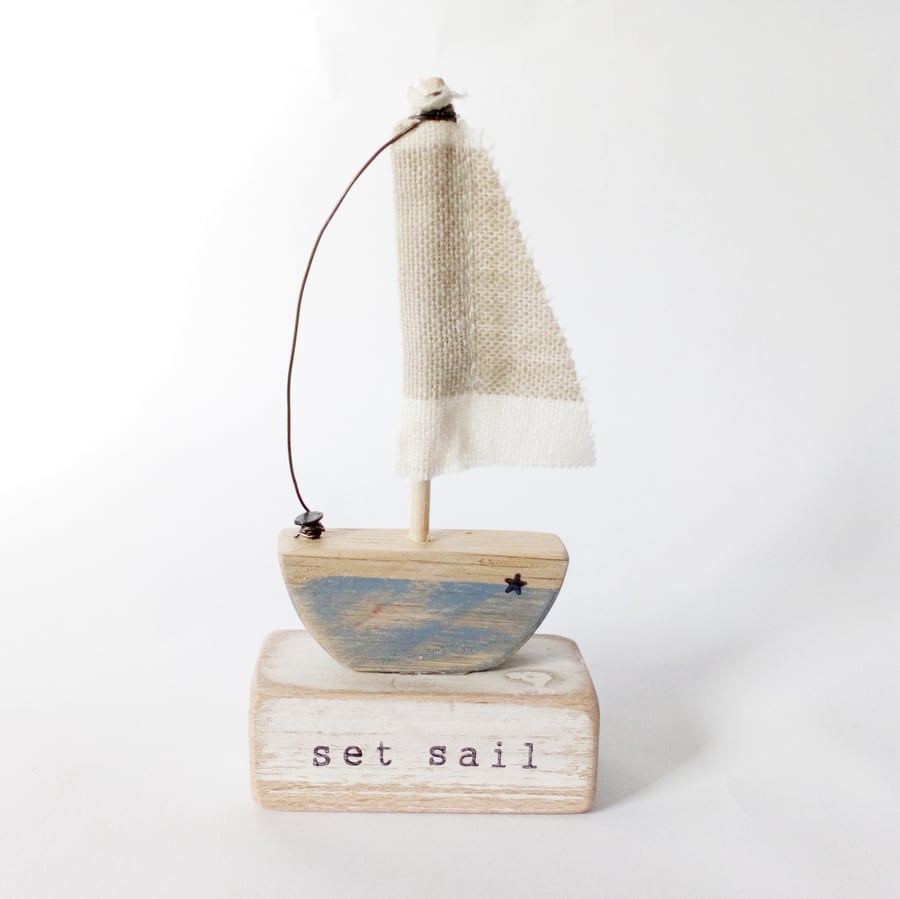 Handmade little wooden sail boat
