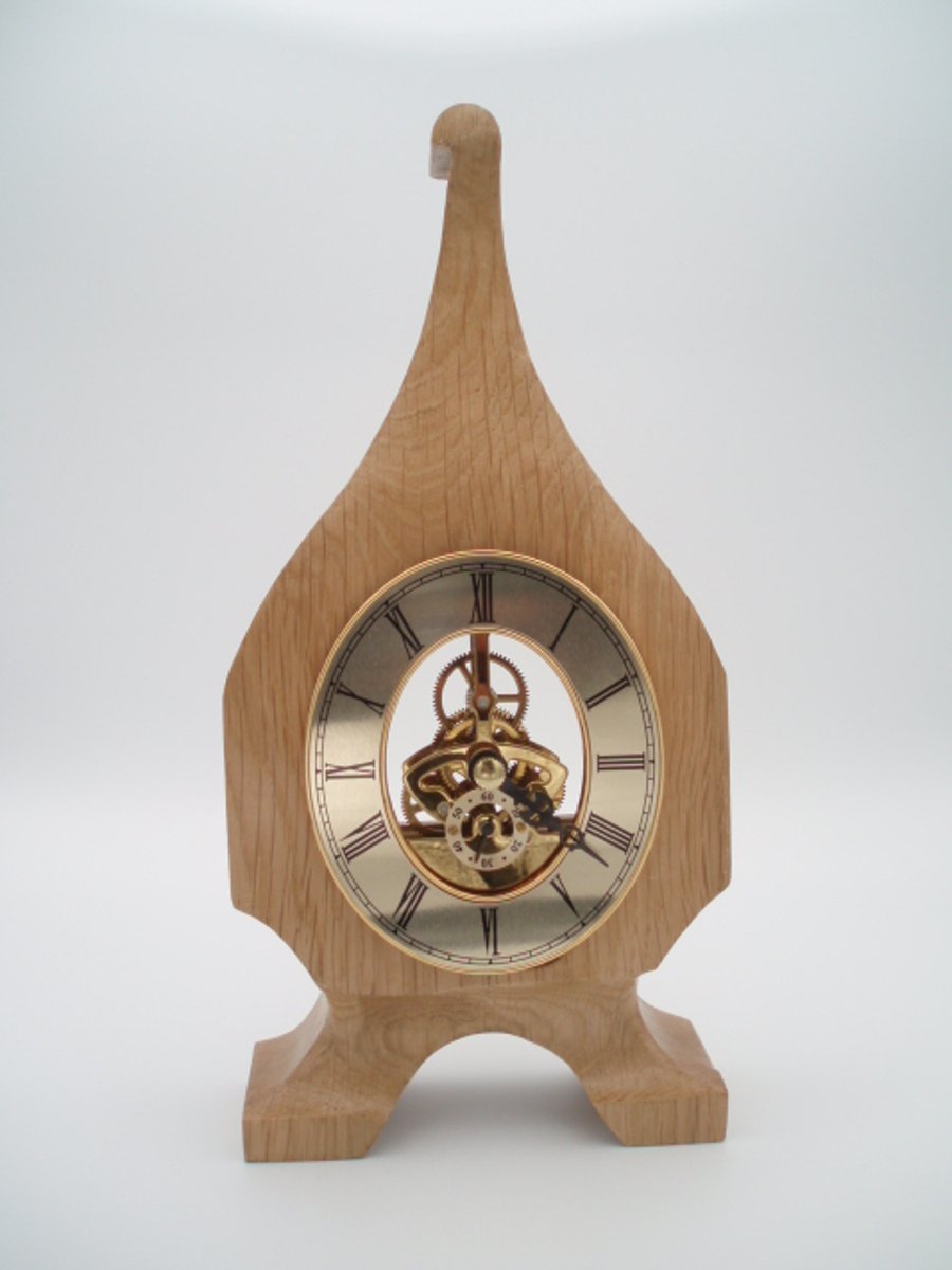 Carved polished Oak skeleton clock