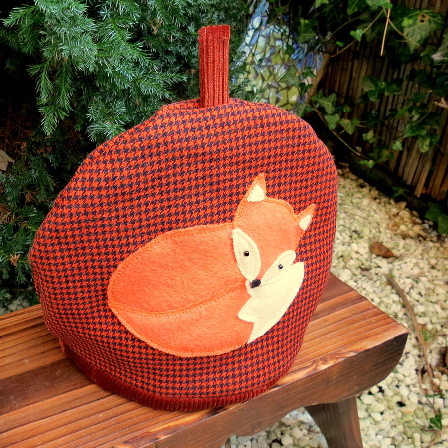 Orange fox.  A tactile wool tea cosy.  Size medium, to fit a 4 cup teapot.