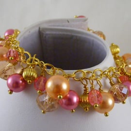 Orange Pink and Gold Charm Bracelet