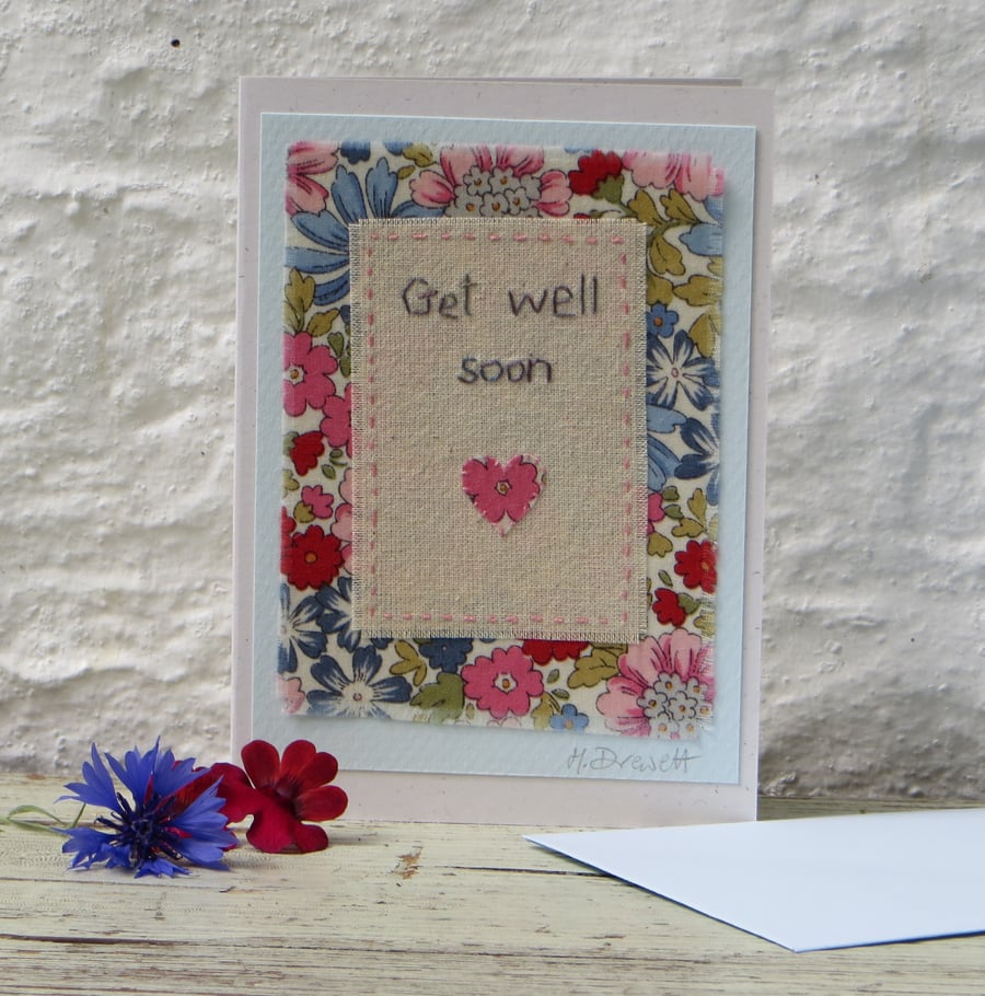 Pretty hand-stitched card with cheerful flower print fabric