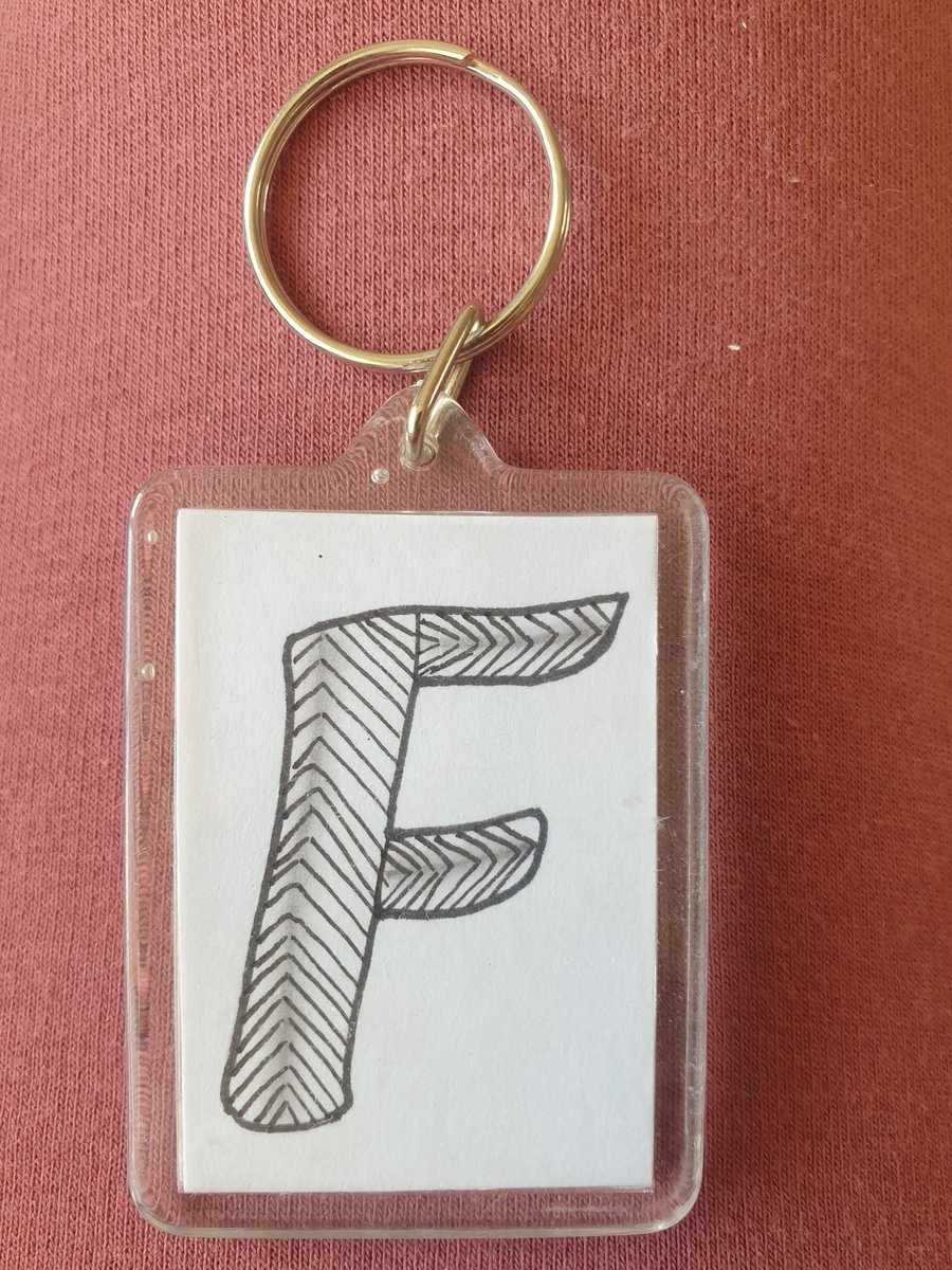 Hand drawn initial "F" keyring.