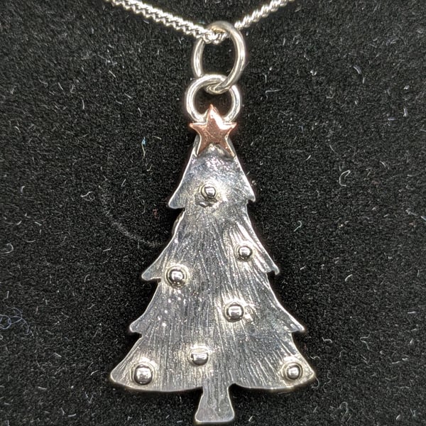 Handcrafted silver and copper Christmas tree pendant