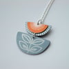 Orange and grey folk art retro style flower pendant